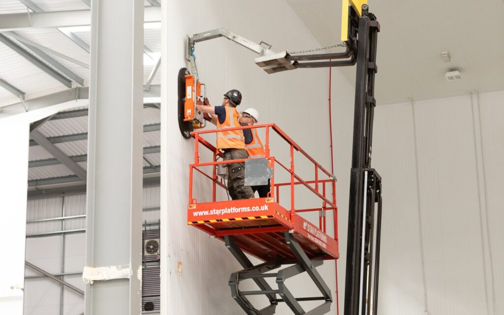 Construction of a cold room with scissor lift using cold room panel